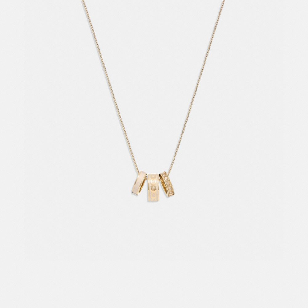 COACH®,Signature Enamel Necklace,Single Strand,Crystal,Enamel,Lettering Word,Logo,Gem Embellishment,Brass,Work,Casual,Beige,Front View