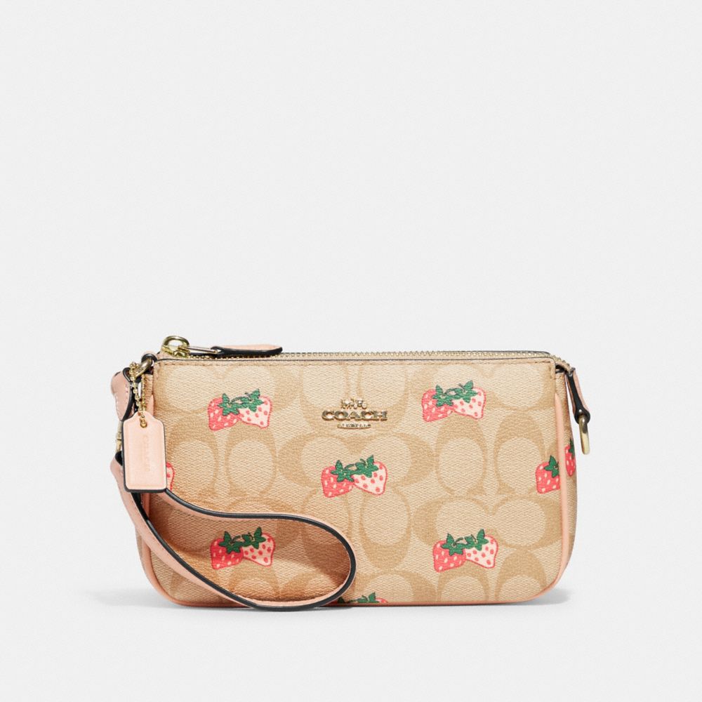 COACH® | Nolita 19 In Signature Canvas With Strawberry Print