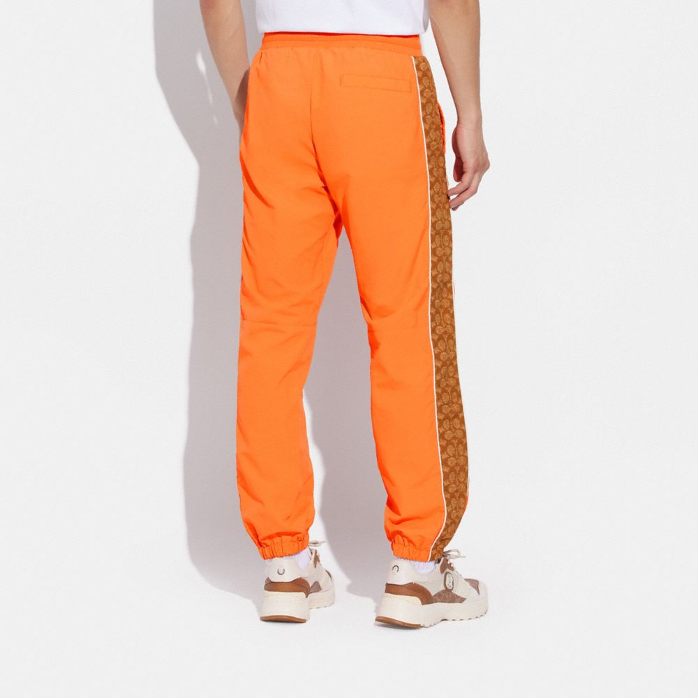 Coach Track Joggers In Orange/tan Signature Multi | ModeSens