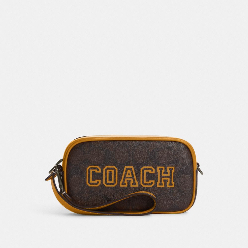Coach Jamie Wristlet In Signature Canvas With Varsity Motif In Multi