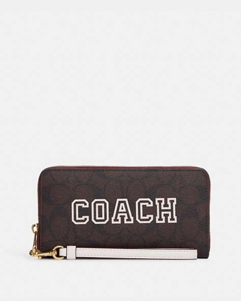 COACH®,LONG ZIP AROUND WALLET IN SIGNATURE CANVAS WITH VARSITY MOTIF,Signature Coated Canvas,Mini,Im/Brown/Chalk Multi,Front View