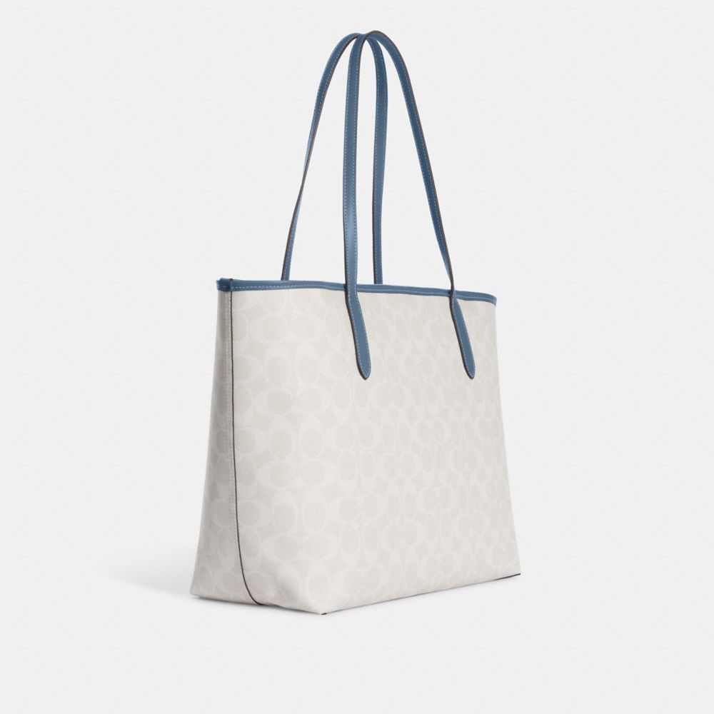 COACH® | City Tote In Signature Canvas With Varsity Motif