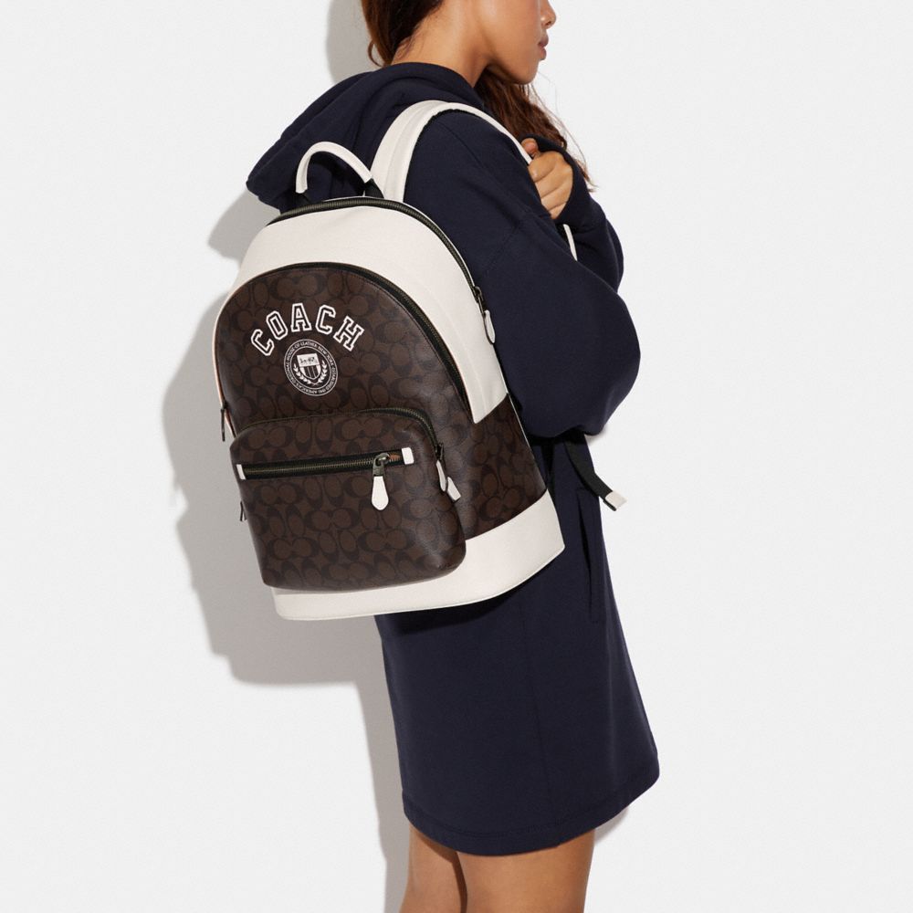 WEST BACKPACK IN SIGNATURE CANVAS WITH VARSITY MOTIF