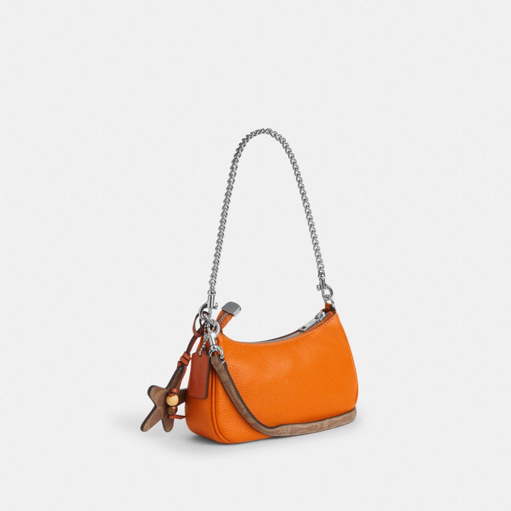COACH®,Teri Mini Crossbody Bag With Star Charm,Leather,Shoulder Bag,Bead Embellishment,Metal,Logo,Day Party,Casual,Burnt Orange,Angle View