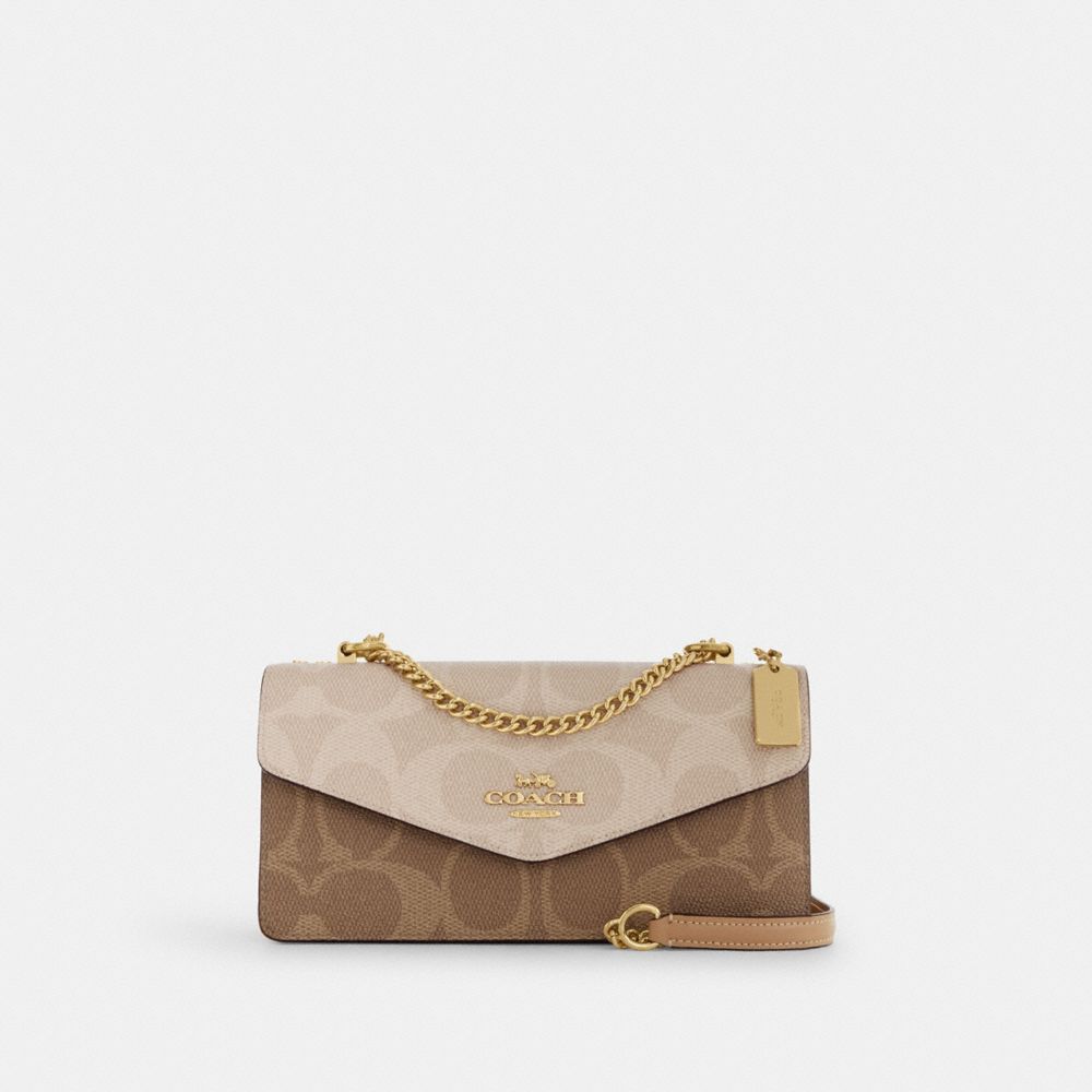 COACH®,Klare Envelope Crossbody Bag In Blocked Signature Canvas,Canvas,Leather,Crossbody,Word Embellishment,Metal,Logo,Gol...,Brown,Front View