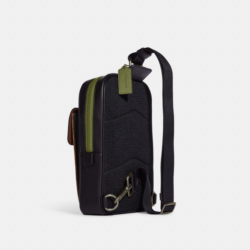 COACH®,Track Pack In Signature Canvas With Coach Patch,,Angle View