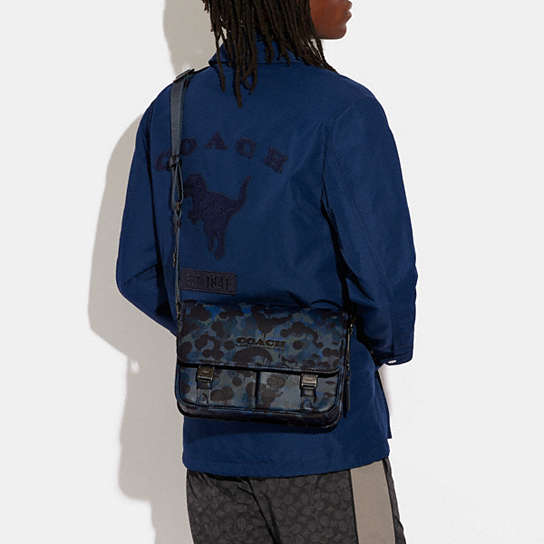 COACH®: League Messenger Bag With Camo Print