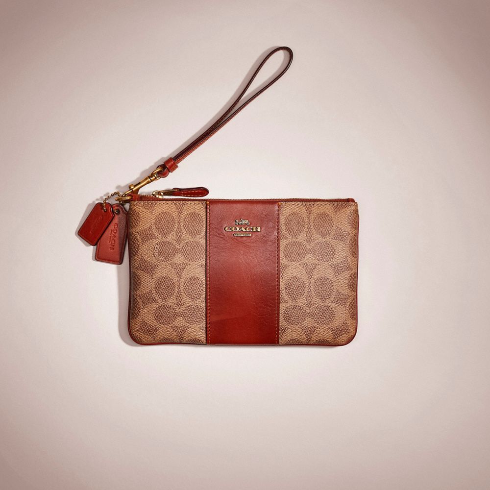 Coach Restored Small Wristlet In Colorblock Signature Canvas In Brass/tan/rust