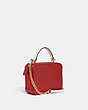COACH®,DISNEY X COACH BOX CROSSBODY WITH CRUELLA MOTIF,Crossgrain Leather,Gold/Red Apple Multi,Angle View