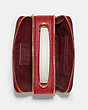 COACH®,DISNEY X COACH BOX CROSSBODY WITH CRUELLA MOTIF,Crossgrain Leather,Gold/Red Apple Multi,Inside View,Top View