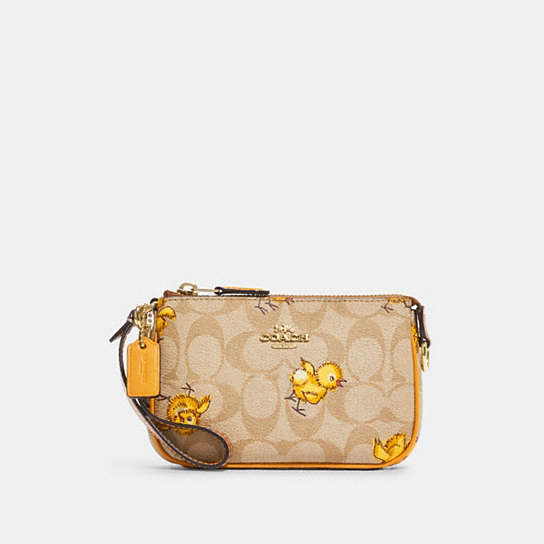 COACH® | Nolita 15 In Signature Canvas With Tossed Chick Print