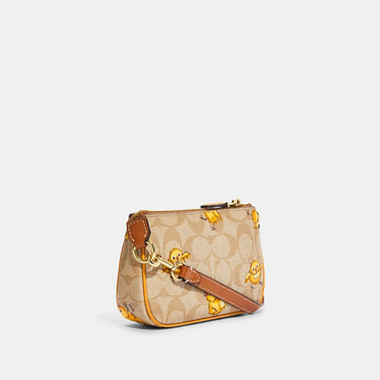 COACH® | Nolita 15 In Signature Canvas With Tossed Chick Print
