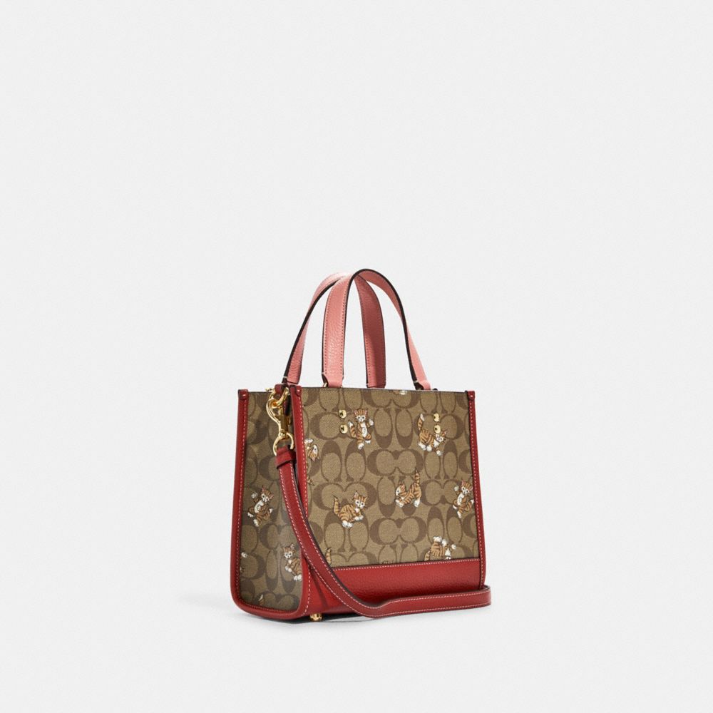 COACH®,Dempsey Tote Bag 22 In Signature Canvas With Dancing Kitten Print,,Angle View
