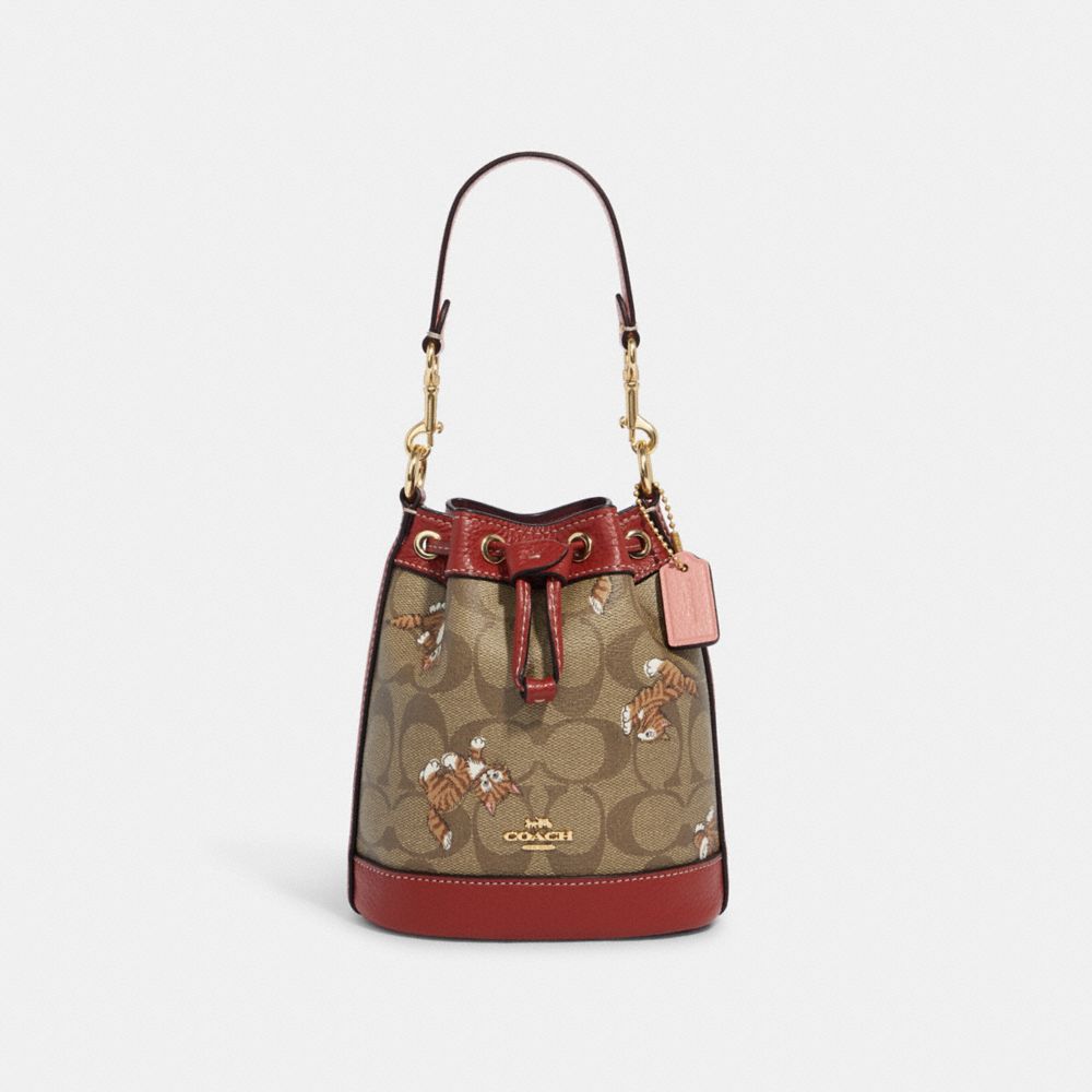 Coach Mini Dempsey Bucket Bag In Signature Canvas With Dancing Kitten Print