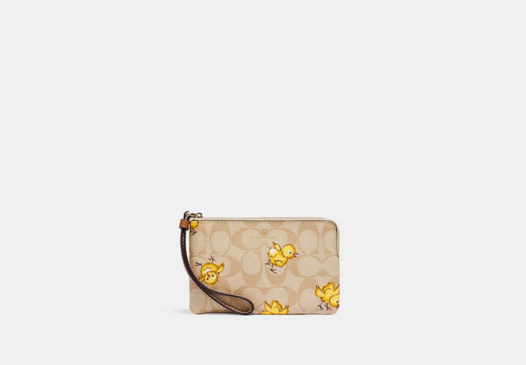 Corner Zip Wristlet In Signature Canvas With Tossed Chick Print