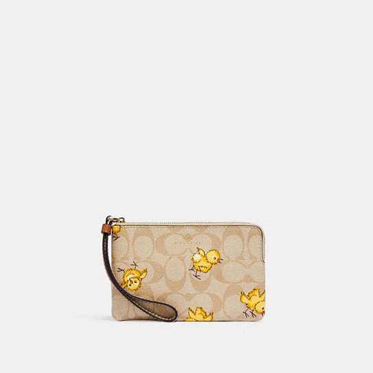 COACH® | Corner Zip Wristlet In Signature Canvas With Tossed Chick Print