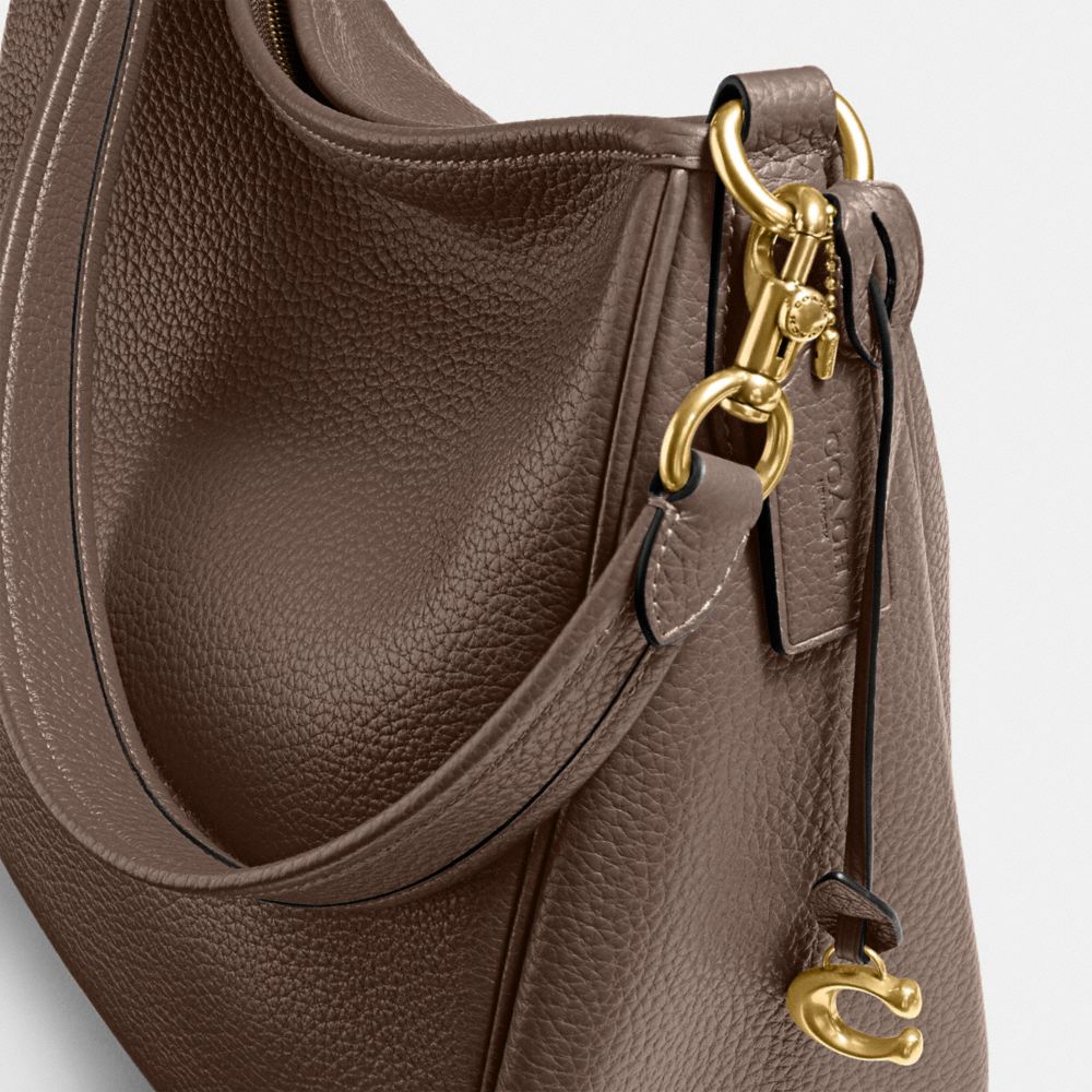 Shop Coach Cary Schultertasche In Brass/dark Stone