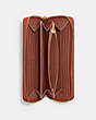 COACH®,ACCORDION ZIP WALLET,Polished Pebble Leather,Mini,Brass/Sun Orange,Inside View,Top View