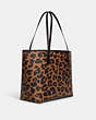 COACH®,CITY TOTE WITH LEOPARD PRINT AND SIGNATURE CANVAS INTERIOR,Leather,Large,Silver/Light Saddle Multi,Angle View