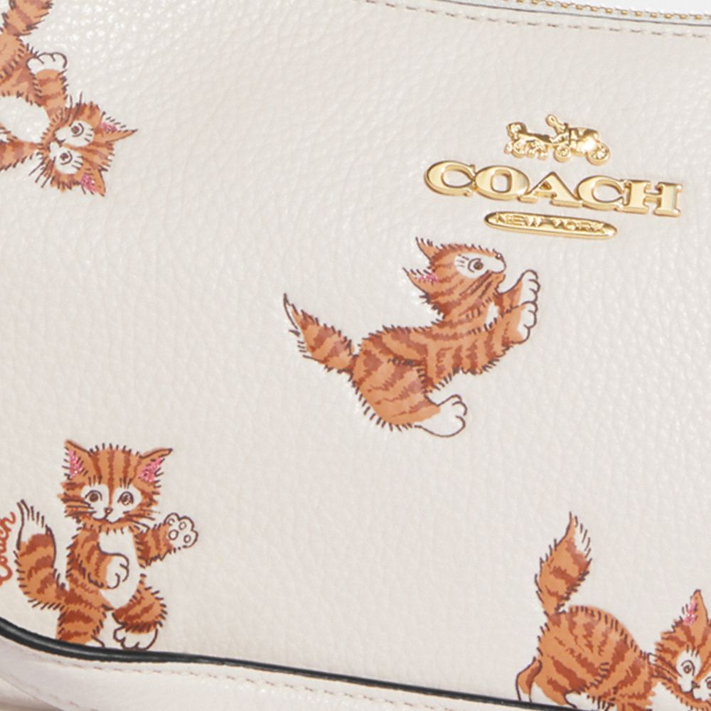 cat purse coach