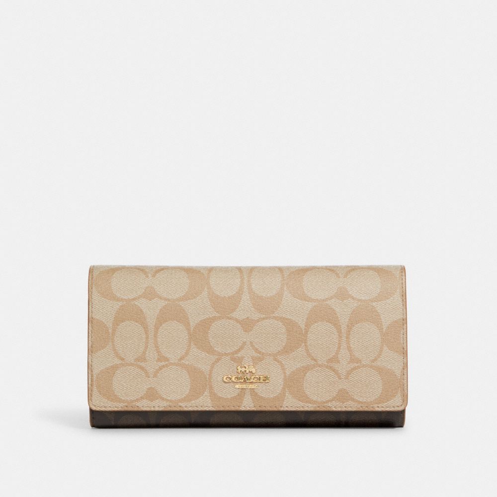 COACH® | Slim Trifold Wallet In Blocked Signature Canvas