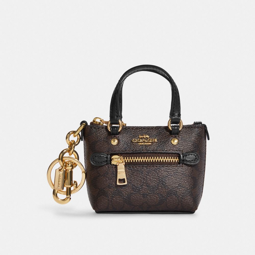 mini coach nolita tote charm｜TikTok Search