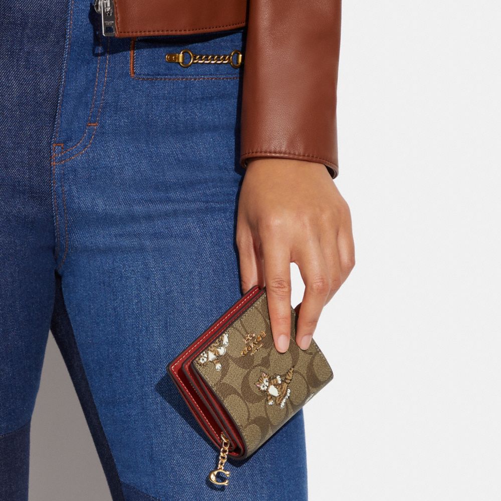 COACH®,Snap Wallet In Signature Canvas With Dancing Kitten Print,,Detail View