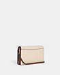 COACH®,ANNA FOLDOVER CLUTCH CROSSBODY IN COLORBLOCK,Refined Pebble Leather,Medium,Im/Ivory/Light Saddle Multi,Angle View