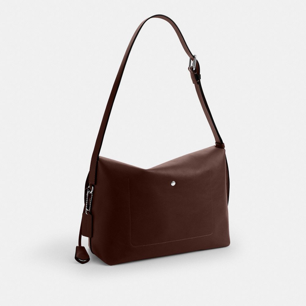 COACH®,Ludlow Messenger Bag,Lining Leather,Leather,Crossbody,Lined,Adjustable,Silver Metal,Casual,Brown,Angle View