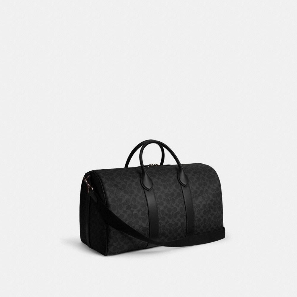 COACH®,Compass Bag 50 In Signature Canvas,Canvas,Leather,Weekender,Gold Metal,Black,Angle View