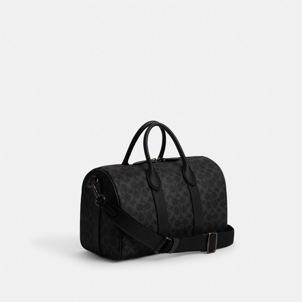 COACH®,Compass Bag 35 In Signature Canvas,Canvas,Leather,Weekender,Gold Metal,Black,Angle View