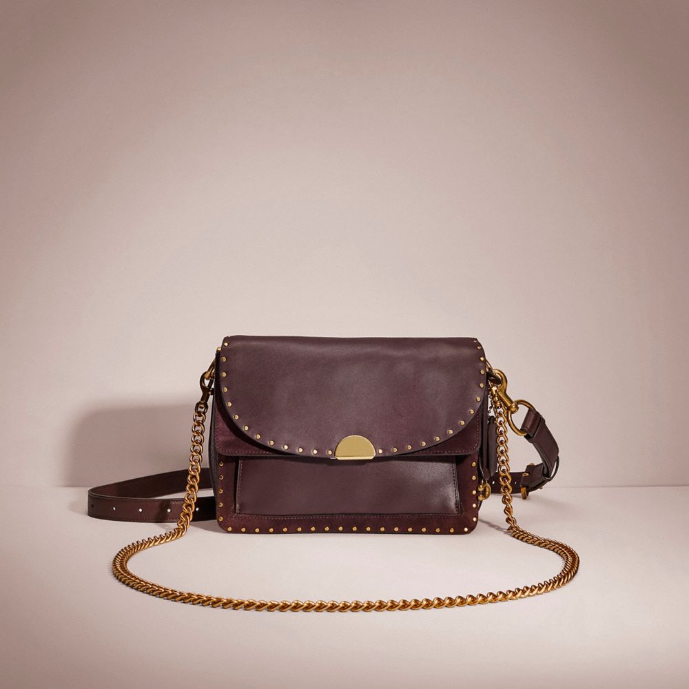 Coach Restored Dreamer Shoulder Bag With Rivets In Brass/oxblood