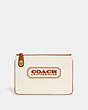 Complimentary Coach Badge Turnlock Pouch