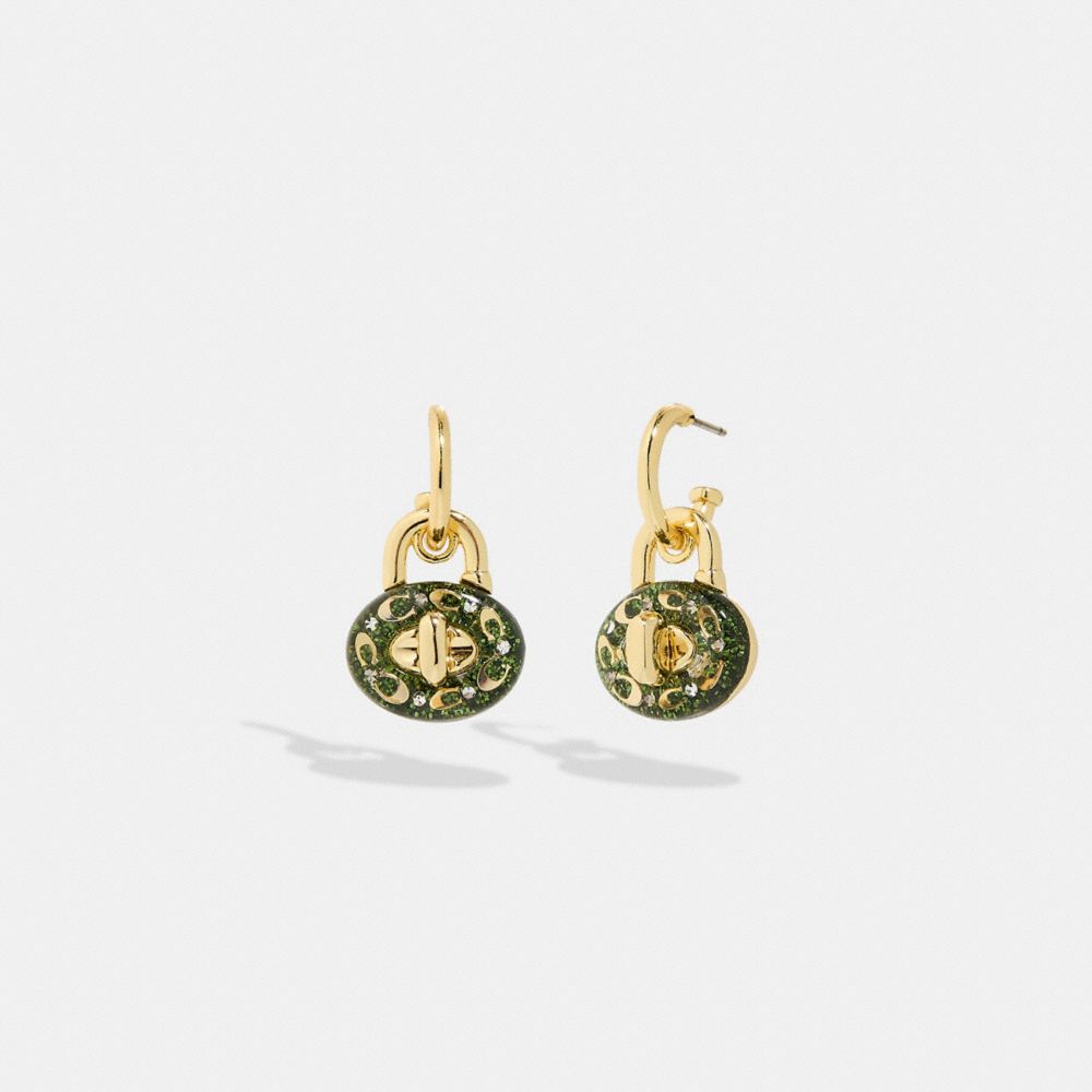 Coach Signature Turnlock Huggie Earrings In Gold/green
