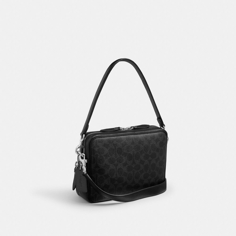 COACH®,Dakota Crossbody Bag In Signature Canvas,Leather,Canvas,Crossbody,Logo,Compact,Lined,Adjustable,Casual,Black,Angle View