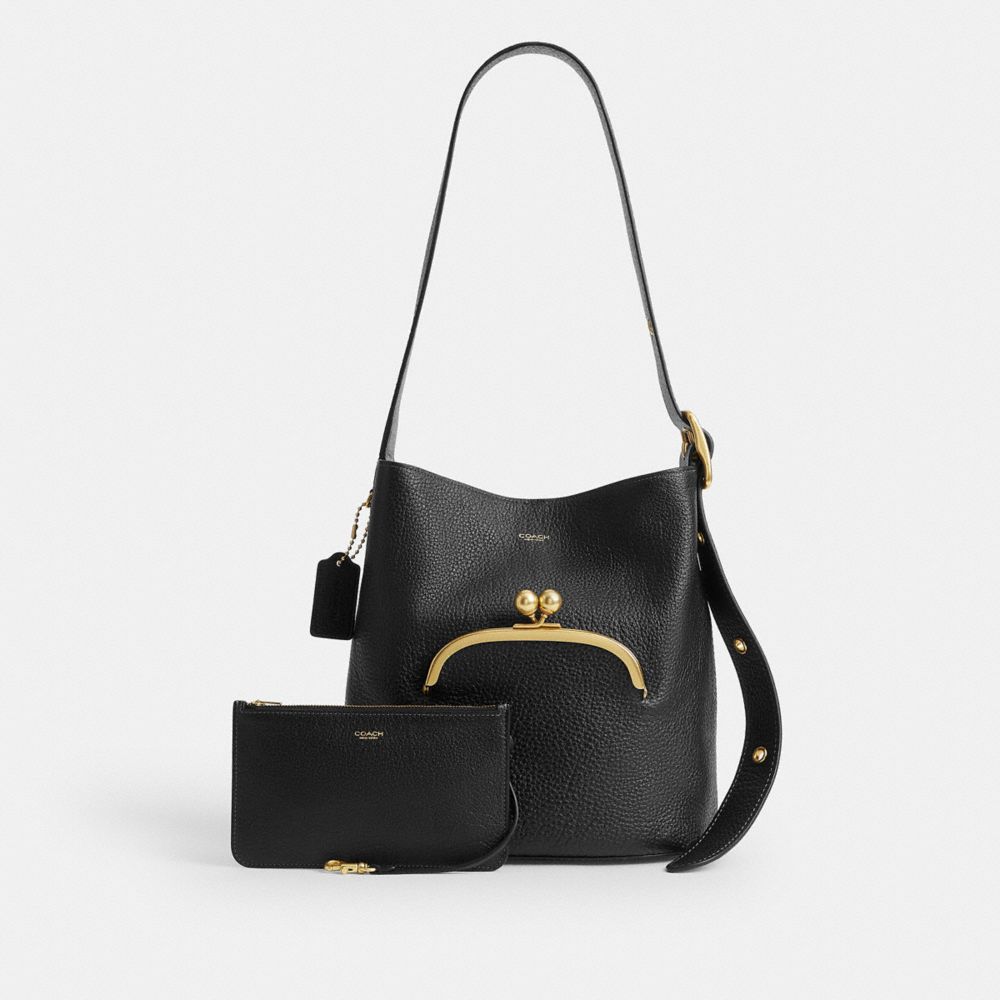 COACH®,Bleecker Bucket Bag With Kisslock,Leather,Bucket,Pendant,Adjustable,Brass,Day Party,Black,Angle View