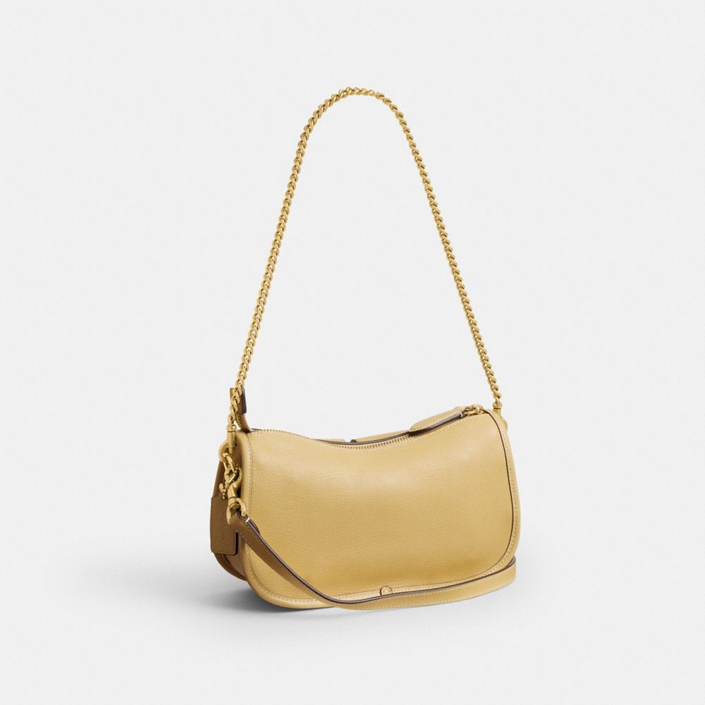 COACH®,Twin Turnlock Waverly Bag,Leather,Lining Cotton,Shoulder Bag,Pendant,Adjustable,Compact,Sustainable,Brass,Gold Meta...,Beige,Angle View