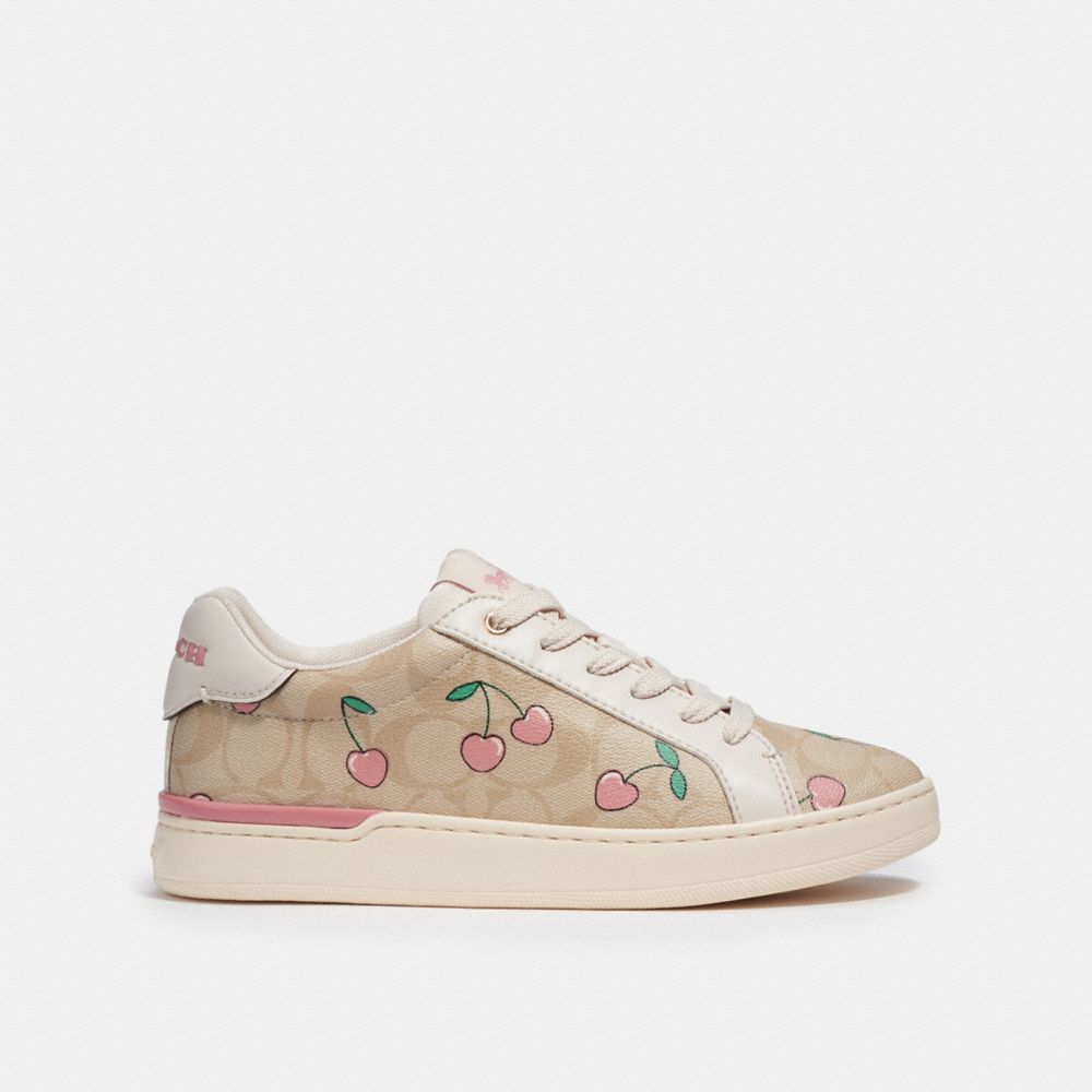 COACH® | Clip Low Top Sneaker In Signature Canvas With Heart Cherry Print