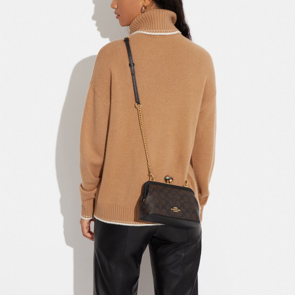 nora kiss lock crossbody