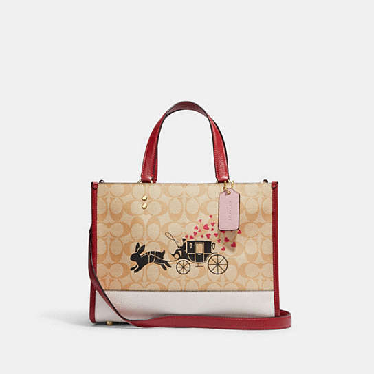COACH® | Lunar New Year Dempsey Carryall In Signature Canvas With Rabbit  And Carriage