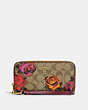 Long Zip Around Wallet In Signature Canvas With Jumbo Floral Print