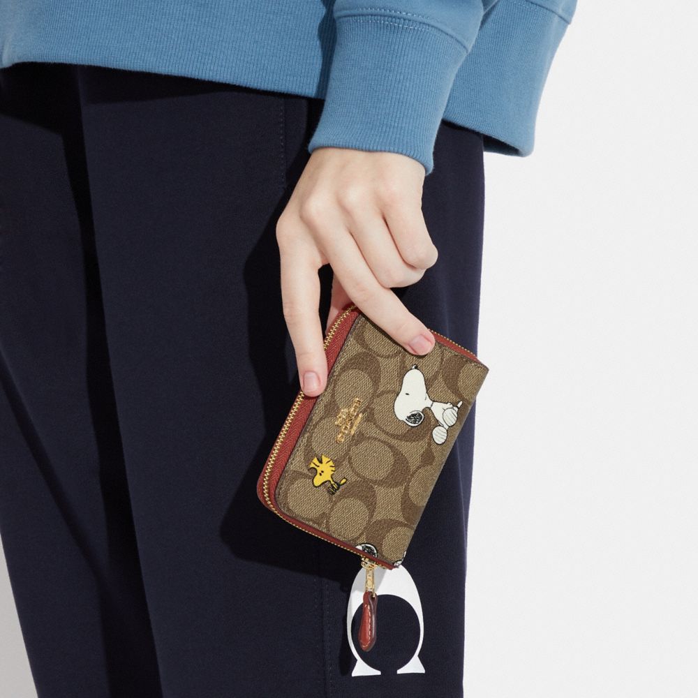 COACH® | Coach X Peanuts Small Zip Around Wallet In Signature