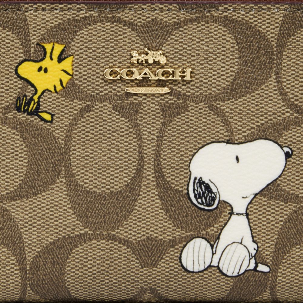 COACH® | Coach X Peanuts Small Zip Around Wallet In Signature