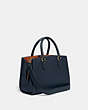 COACH®,BROOKE CARRYALL 28,Polished Pebble Leather,Medium,Brass/Midnight Navy,Angle View