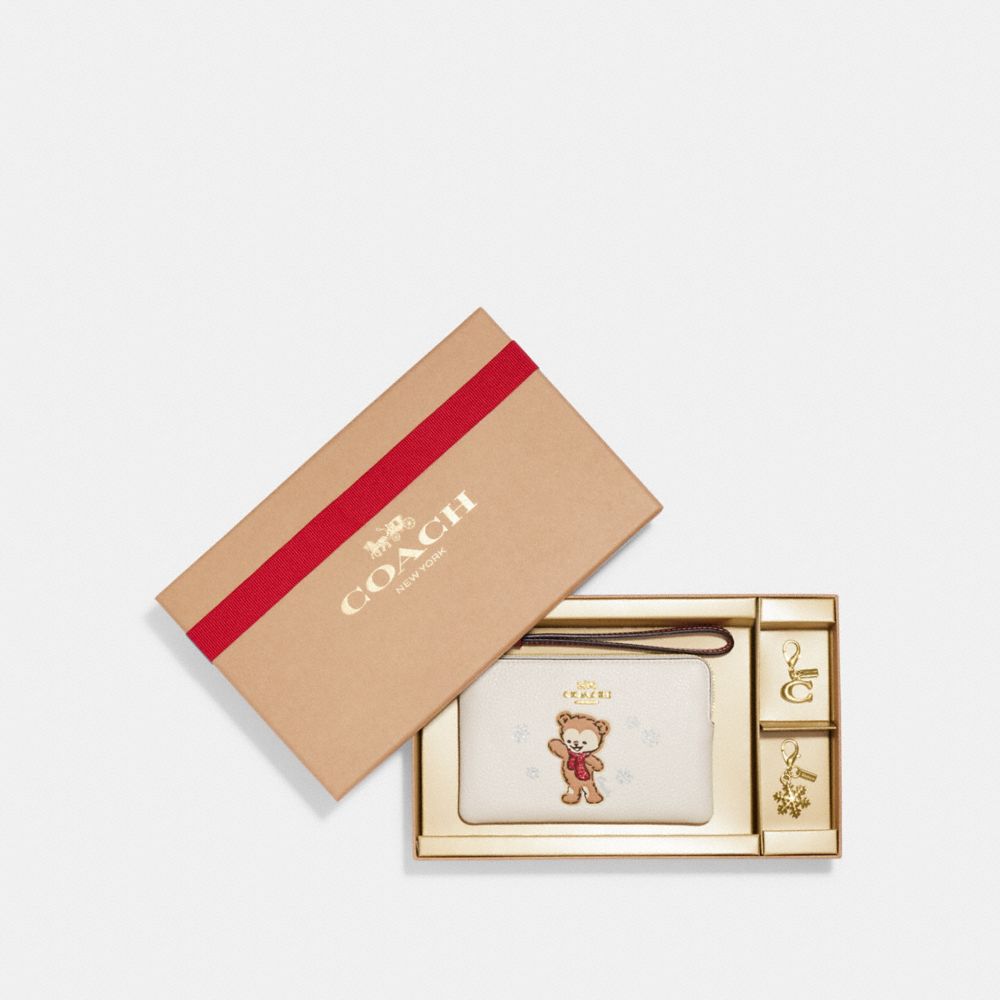 COACH® | Boxed Corner Zip Wristlet With Bear Snowflake Motif