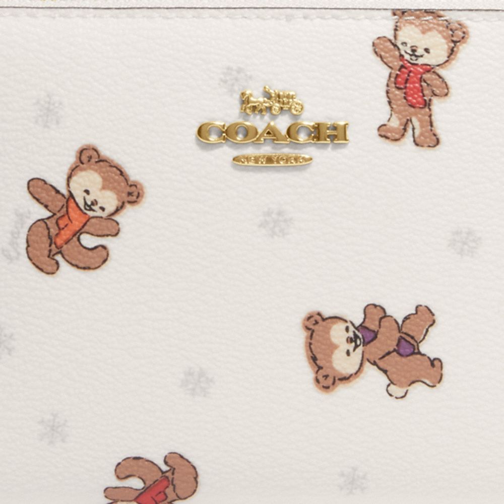 COACH® | Medium Corner Zip Wallet With Bear Snowflake Print