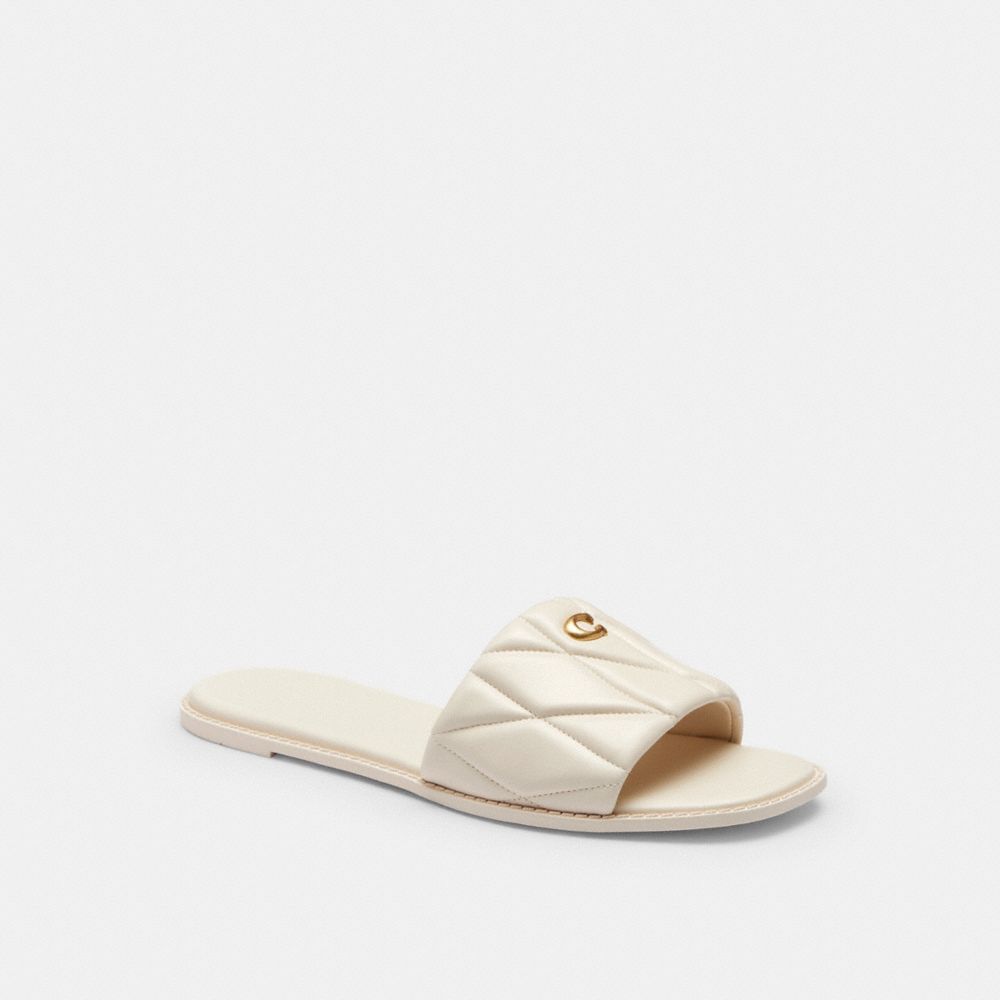 COACH®,Holly Sandal With Quilting,Rubber,Lining Rubber,Lining Leather,Leather,Slides,Metal,Logo,Traction,Cushioned,Casual,Cream,Front View