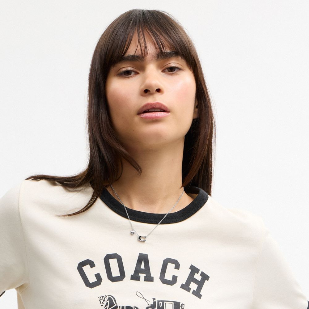 COACH®,Enamel Signature Heart Charm Pendant Necklace,Single Strand,Glass,Enamel,Cubic Zirconia,Gem Embellishment,Initials ...,Black,Detail View