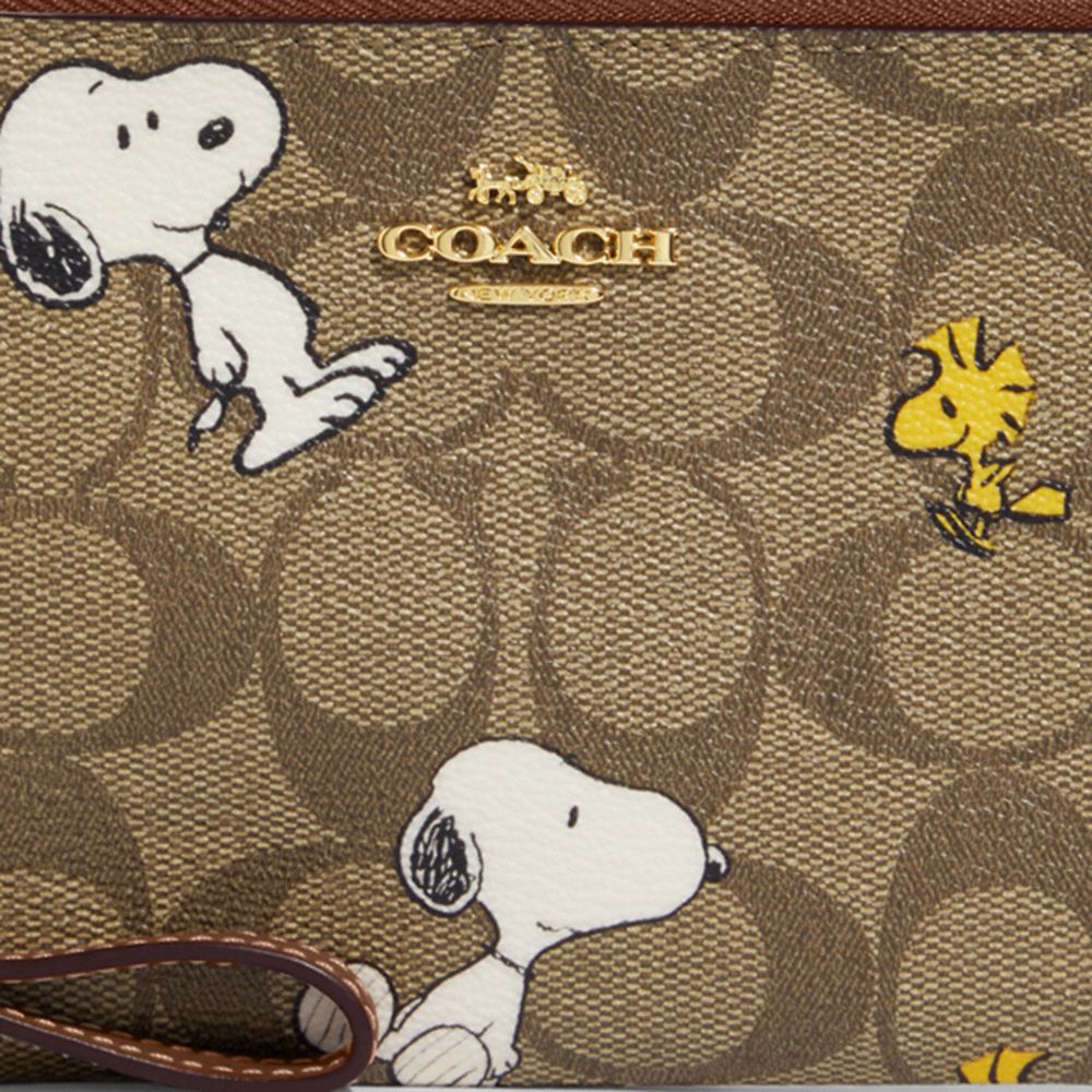 公式 コーチアウトレット Coach X Peanuts コーナー ジップ リストレット シグネチャー スヌーピー ウッドストック