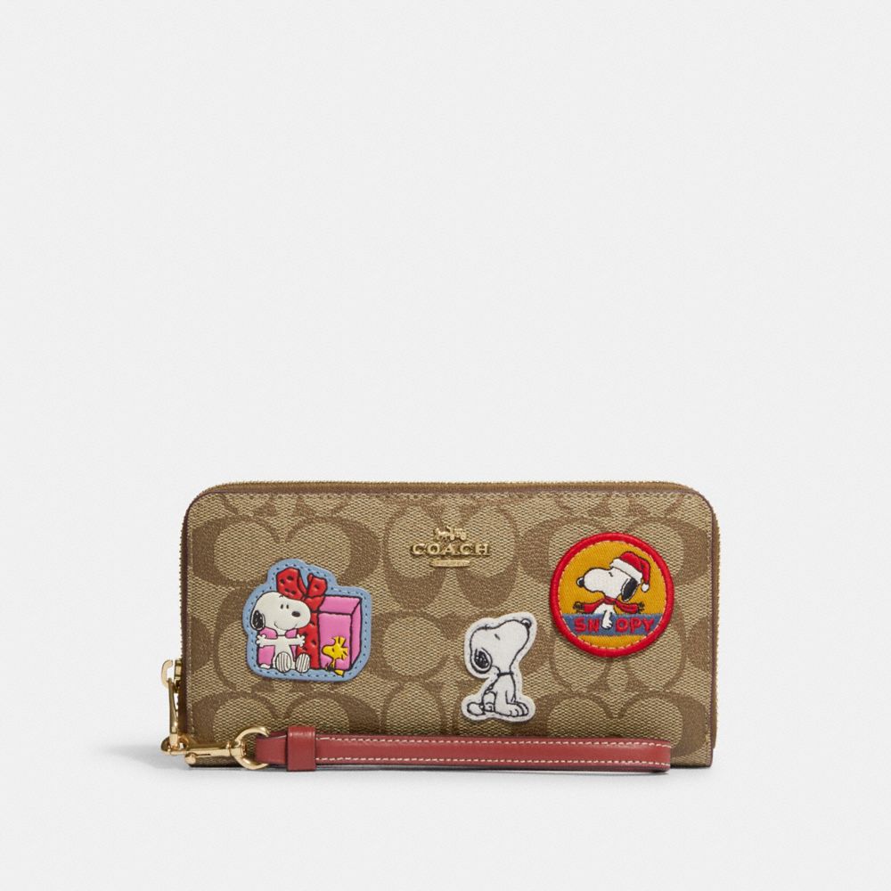 COACH® Coach X Peanuts Long Zip Around Wallet In Signature Canvas With Patches